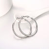 Round Diamond Earrings in White Gold