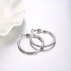 Round Diamond Earrings in White Gold