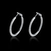 Round Diamond Earrings in White Gold