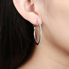 Round Diamond Earrings in White Gold